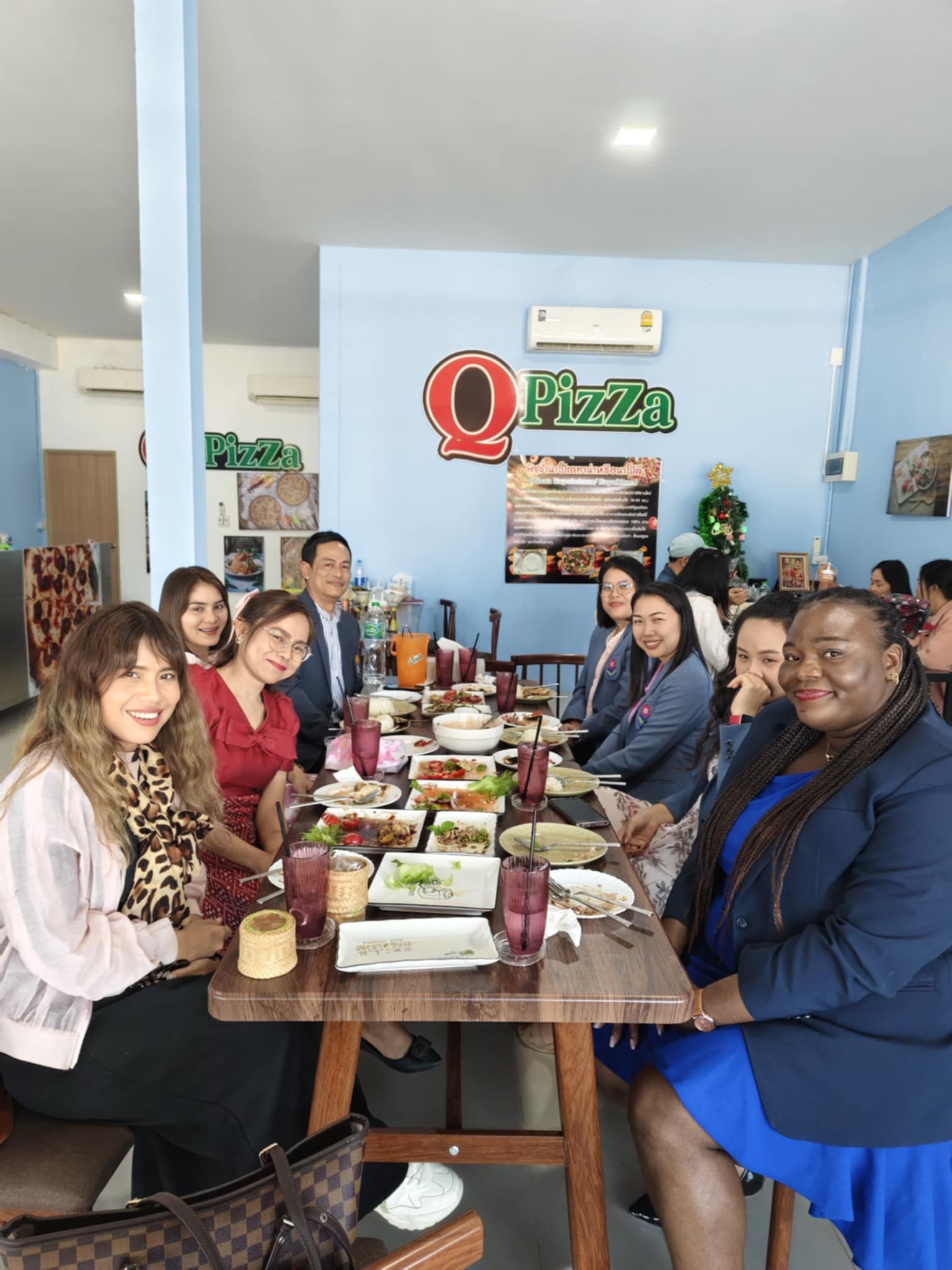 Guests at QPizza